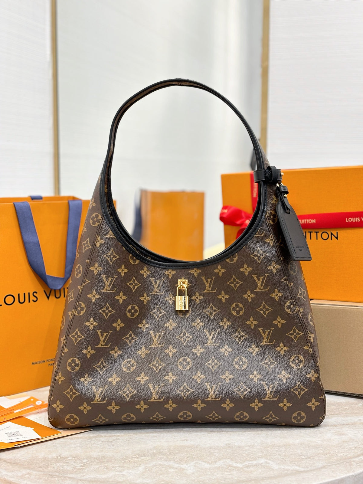 Louis Vuitton The Drop GM Monogram Women Handbags